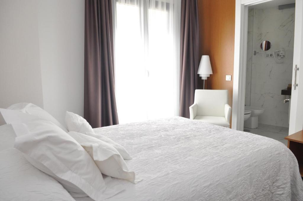 Toral Hotel Леон Номер фото